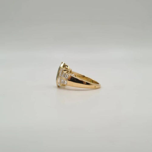 Bague 50 Bague en or jaune 18 carats avec péridot et diamants 58 Facettes