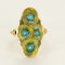 Bague 58.5 Bague en or jaune à motif de fleur stylisée, émail et turquoises 58 Facettes PRG2092
