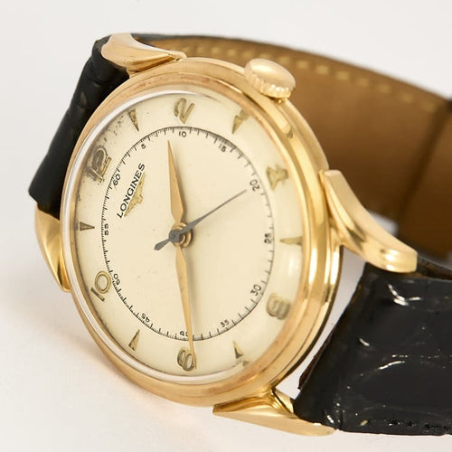 Montre Longines - montre d'homme en or rose 58 Facettes GU300