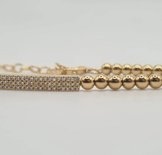 Bracelet Bracelet or jaune serti d’une barrette de diamants 58 Facettes
