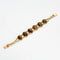 Bracelet Bracelet articulé en or jaune 18k et œil de tigre 58 Facettes