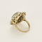 Bague 53.5 Importante bague marguerite en or blanc, opale et diamants 58 Facettes FOU1633