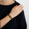 Bracelet Bracelet articulé en or jaune 18k et œil de tigre 58 Facettes