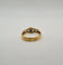 Bague 56 Bague or jaune sertie de diamants et d’un saphir 58 Facettes