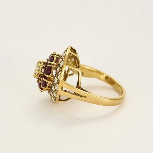 Bague 55 Bague tourbillon en or jaune 18k et rubis, diamants 58 Facettes PL02