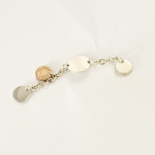 Boucles d'oreilles Hermès - Confettis -  Boucles d'oreilles en argent et or rose. 58 Facettes 58FC30-2