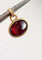 Pendentif Breloque ancienne ovale or jaune avec cabochon de grenat 58 Facettes