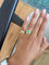 Bague 54 Bague Tourbillon or jaune, émeraude et diamants 58 Facettes
