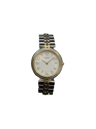 Montre Hermès Clipper - Montre vintage quartz en or et acier 58 Facettes