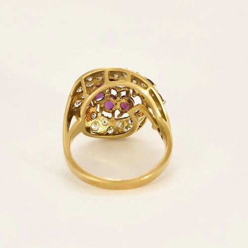 Bague 55 Bague tourbillon en or jaune 18k et rubis, diamants 58 Facettes PL02