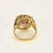 Bague 55 Bague tourbillon en or jaune 18k et rubis, diamants 58 Facettes PL02