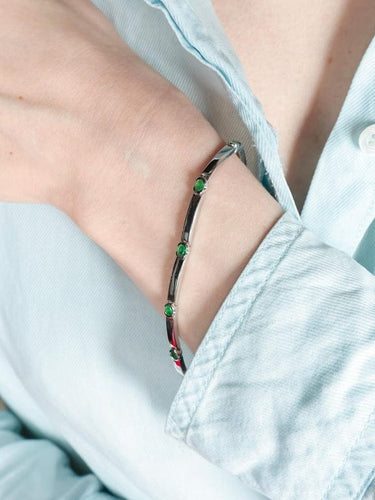 Bracelet Bracelet - Bracelet en or gris et émeraudes 58 Facettes 437 00023