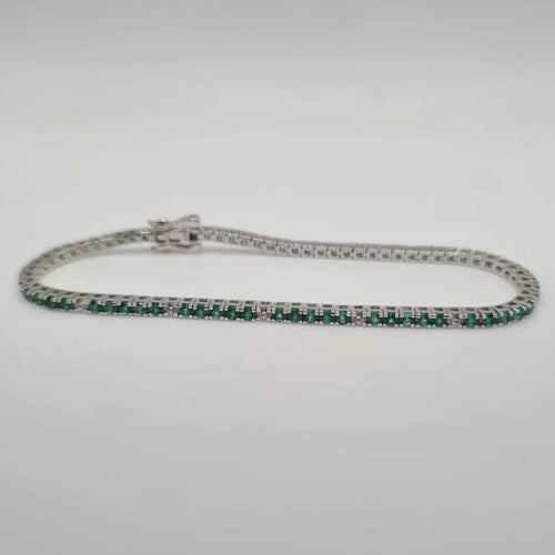 Bracelet Rivière or blanc sertie de diamants et émeraudes 58 Facettes