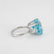 Bague 54 Bague en or blanc, topaze et diamants 58 Facettes
