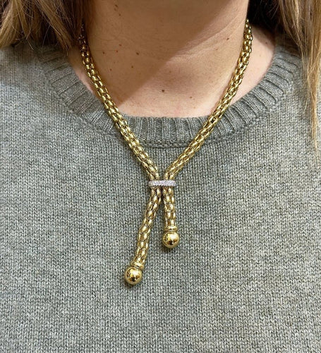 Collier Collier maille Popcorn à pompons en or 18 carats 58 Facettes