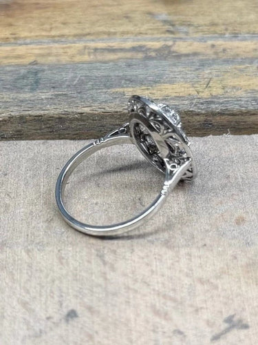 Bague 54 Bague Pompadour en platine et diamants 58 Facettes