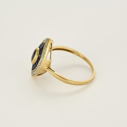 Bague 62 Bague navette en or jaune, diamants et saphirs calibrés 58 Facettes DINA0288X2