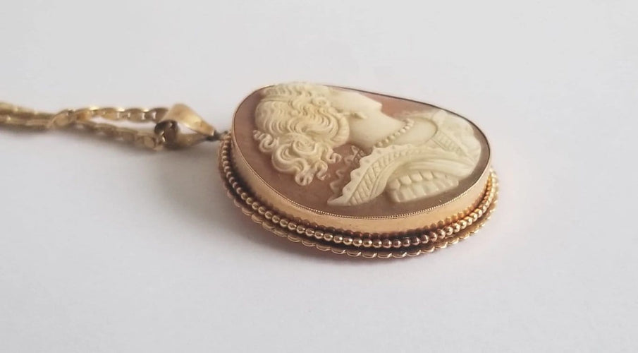 Collier Collier chaîne et pendentif camée en or jaune 18k 58 Facettes