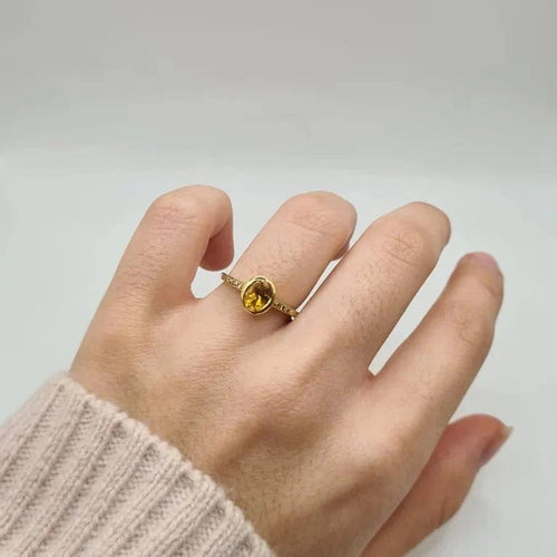 Bague 52 Solitaire - Bague en or jaune 18 carats sertie d’une citrine ovale 58 Facettes