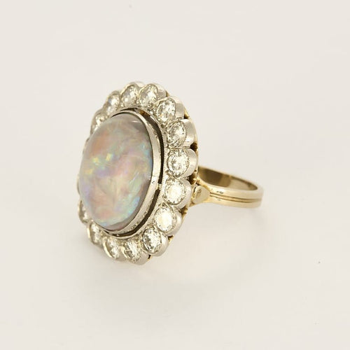 Bague 53.5 Importante bague marguerite en or blanc, opale et diamants 58 Facettes FOU1633