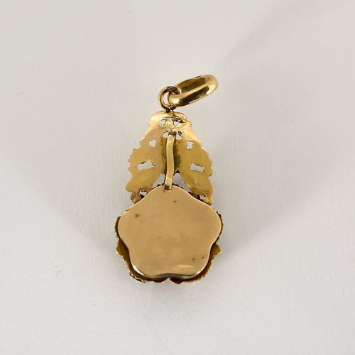 Pendentif Pendentif en or jaune et argent à motif de fleur, diamants, perles blanches de culture et pierre bleue 58 Facettes DAX0101X2