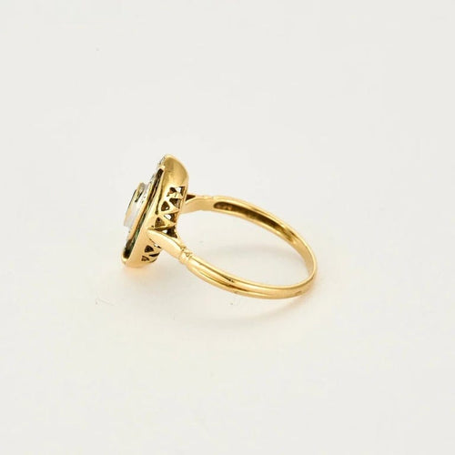 Bague 57 Bague or jaune, émeraude et diamants 58 Facettes THI02131