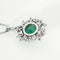 Collier Collier pendentif motif rayonnant en or blanc 18k, émeraude cabochon et diamants 58 Facettes EB5
