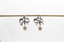 Boucles d'oreilles Boucles d'oreilles or blanc Noeuds perles et diamants 58 Facettes 5864