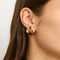 Boucles d'oreilles Boucles d'oreilles nœud de passementerie en or jaune 18k, corail et améthystes 58 Facettes ALGU10