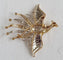 Broche Broche OISEAU DE PARADIS or jaune diamants 58 Facettes R 1137  MKEE