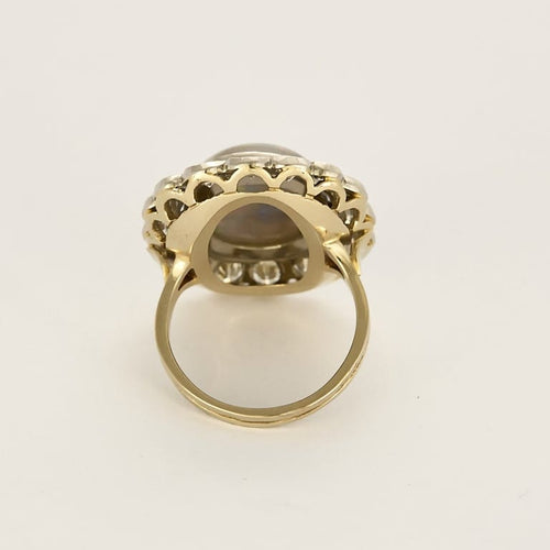 Bague 53.5 Importante bague marguerite en or blanc, opale et diamants 58 Facettes FOU1633