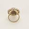 Bague 53.5 Importante bague marguerite en or blanc, opale et diamants 58 Facettes FOU1633