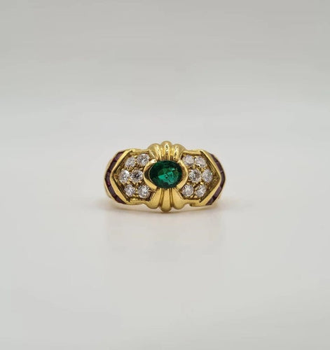Bague 50 Bague or jaune sertie d’émeraude, diamants et rubis 58 Facettes