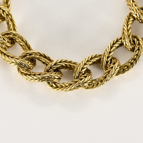 Collier Chaîne en or jaune à maille gourmette tressée 58 Facettes LOR4253
