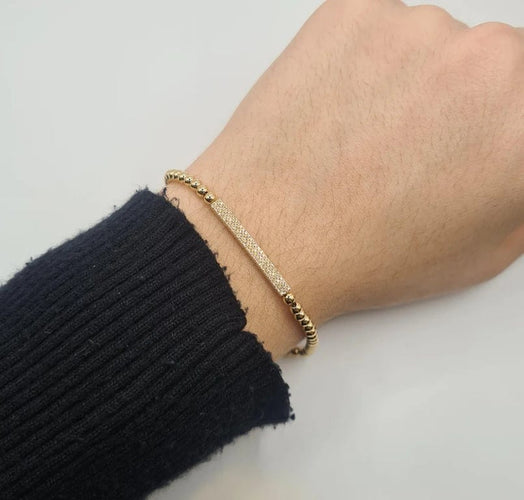 Bracelet Bracelet or jaune serti d’une barrette de diamants 58 Facettes
