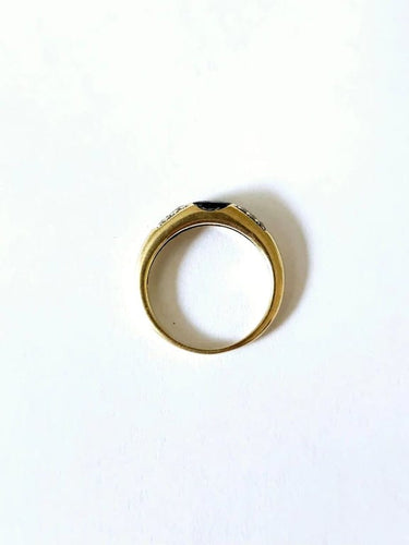 Bague 56 Bague or jaune, saphir et diamants 58 Facettes