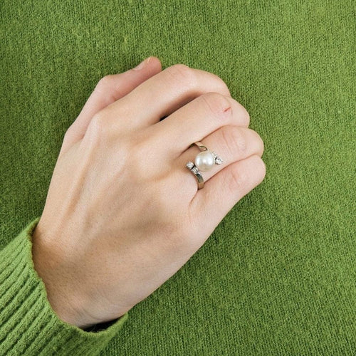 Bague 61 Bague à perle de culture en platine et or gris 18k, diamants 58 Facettes BG6