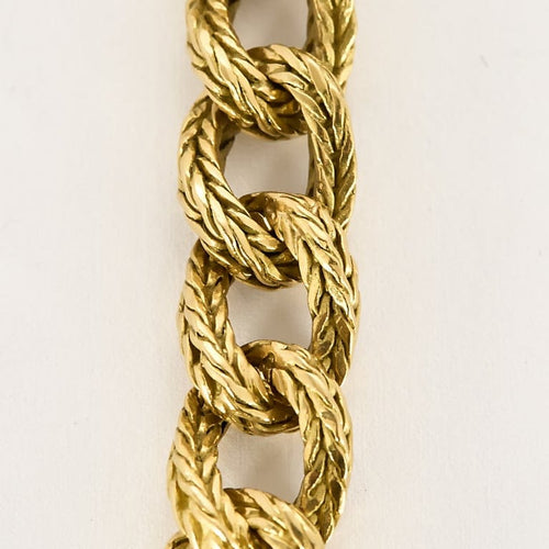 Collier Chaîne en or jaune à maille gourmette tressée 58 Facettes LOR4253