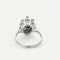 Bague 53 Bague marguerite or blanc, émeraude et diamants 58 Facettes EPI10662