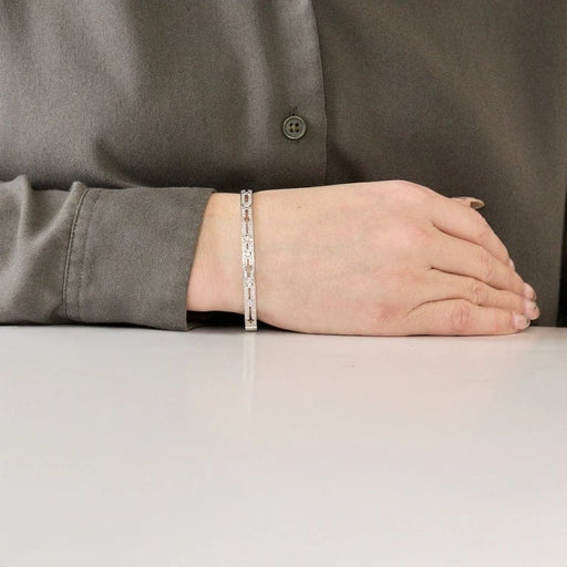 Bracelet DINH VAN - Pulse - Bracelet or blanc et diamants 58 Facettes 58FC161