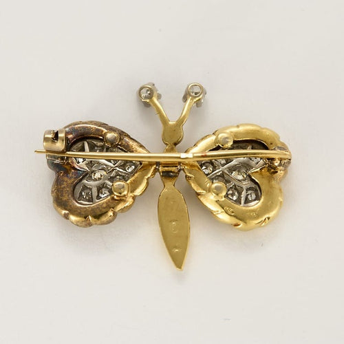 Broche Broche papillon en Or jaune, or gris et diamants 58 Facettes CAN1572
