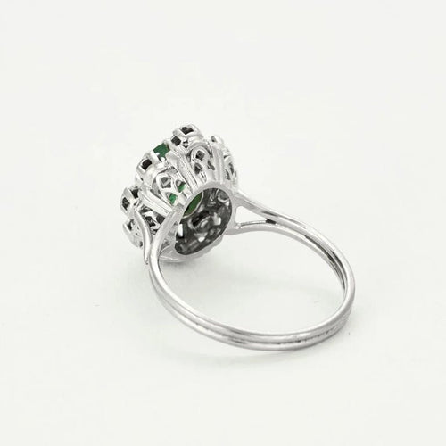 Bague 53 Bague marguerite or blanc, émeraude et diamants 58 Facettes EPI10662
