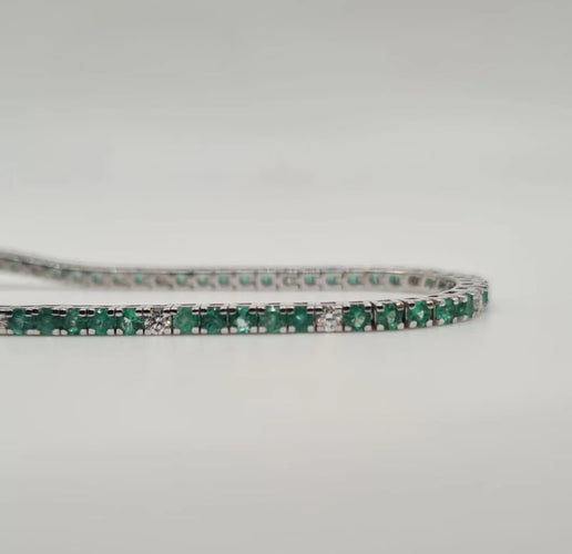 Bracelet Rivière or blanc sertie de diamants et émeraudes 58 Facettes