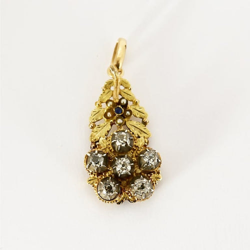 Pendentif Pendentif en or jaune et argent à motif de fleur, diamants, perles blanches de culture et pierre bleue 58 Facettes DAX0101X2