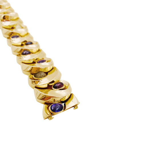 Bracelet Bracelet vintage en or jaune 750 serti d’améthystes, grenats et quartz rutile 58 Facettes 35227