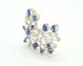 Broche Broche en or blanc 18 kt avec diamants et saphirs 58 Facettes 8226