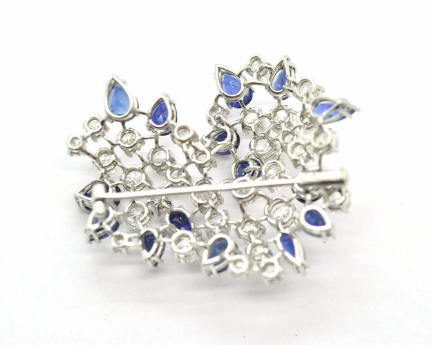 Broche Broche en or blanc 18 kt avec diamants et saphirs 58 Facettes 8226