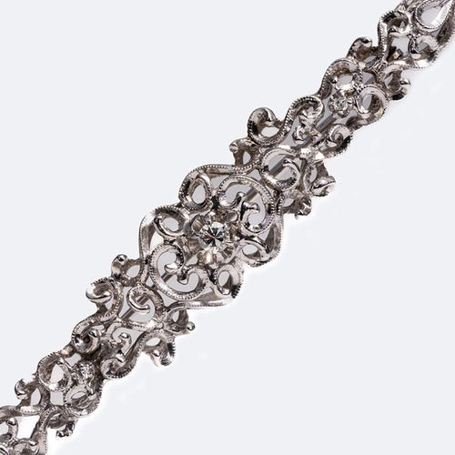 Broche Oro Bianco Broche vintage en or blanc avec diamant 58 Facettes SPL28