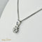 Pendentif Pendentif en or blanc 14 carats avec diamants 58 Facettes 2313