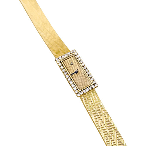 Montre UTI - Montre vintage en or jaune 750/000 et diamants 58 Facettes 34991